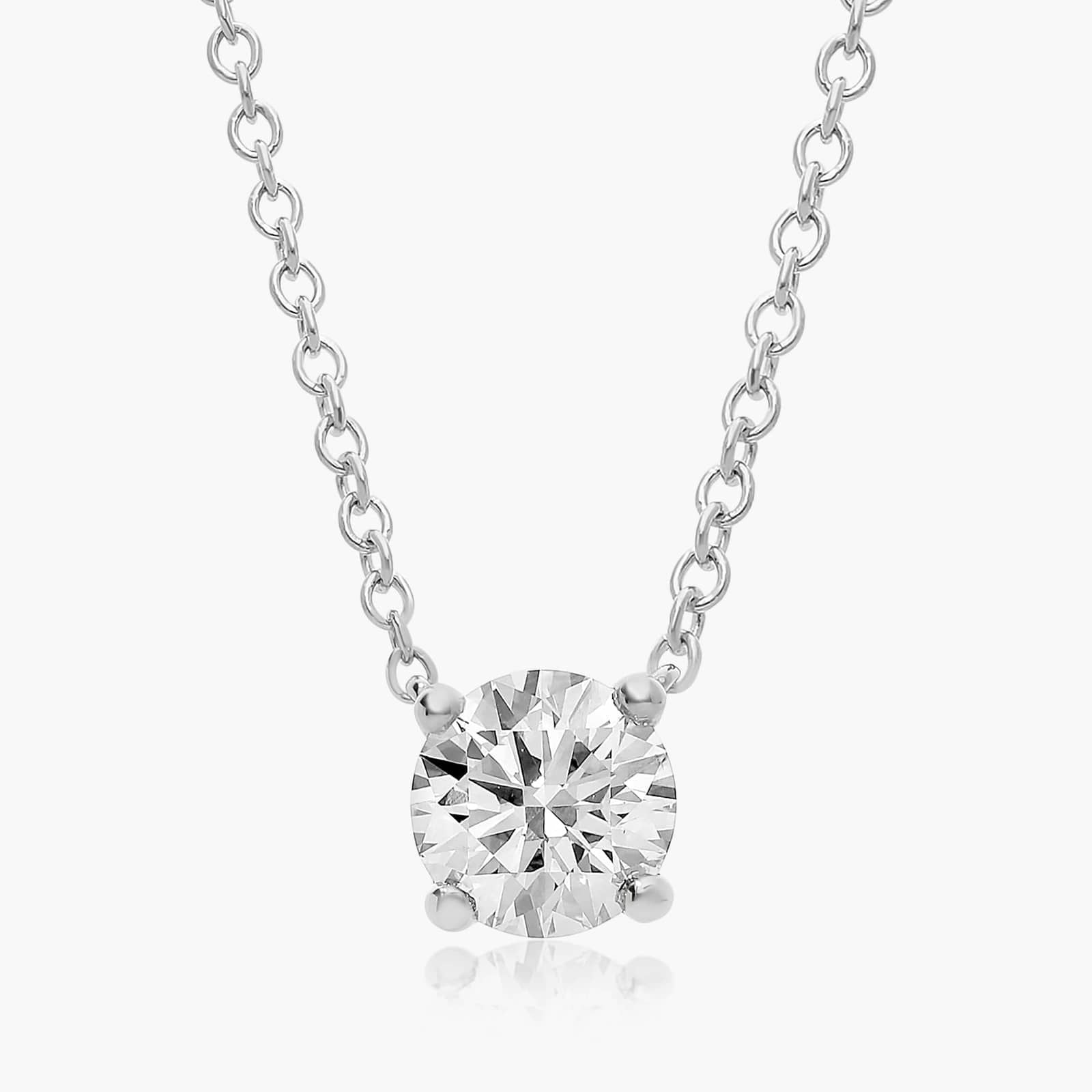 Solitaire Lab Diamond Pendant: 0.25 ct (F-G, VS2-SI1) in a 14K Yellow/White Gold 4-Prong Basket Mount.